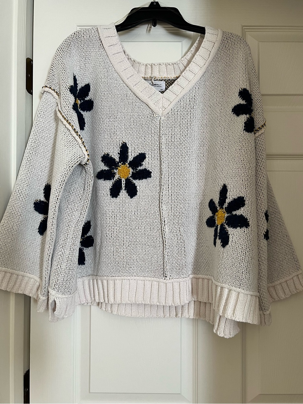Carly Jean Los Angeles Cream V-Neck Sweater with Navy & Yellow Floral Motif